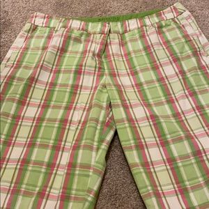 Plaid pink, green, and white chino shorts